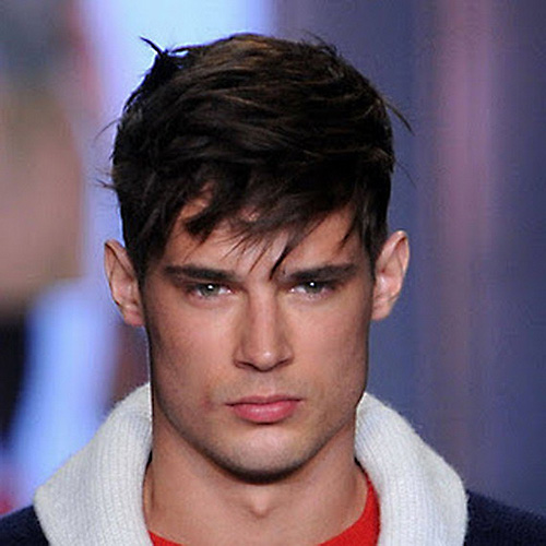 A classic mens hairstyle with bangs