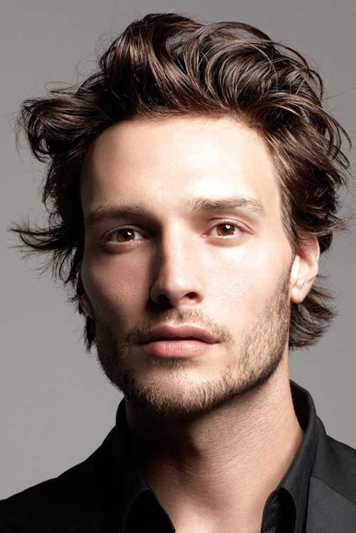 Men with medium length side parted hairstyle